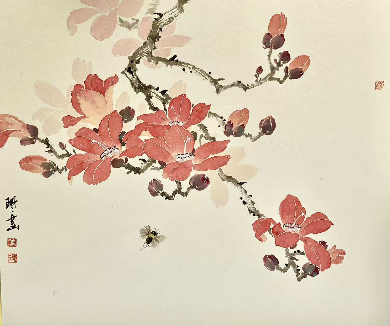 Original photograph: Red blossoms, fine branches and a small bee stand against open paper.